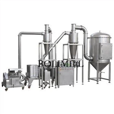 Herb moulen fanm k'ap pile machin